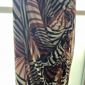 Abstract Patterned Dress
comfortable, stretchy material
Zipper back
Flattering